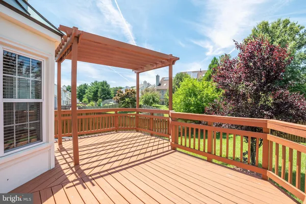 a house view with a sitting space and garden