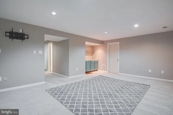 a bathroom with a sink toilet and vanity