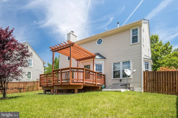 a view of balcony with a deck