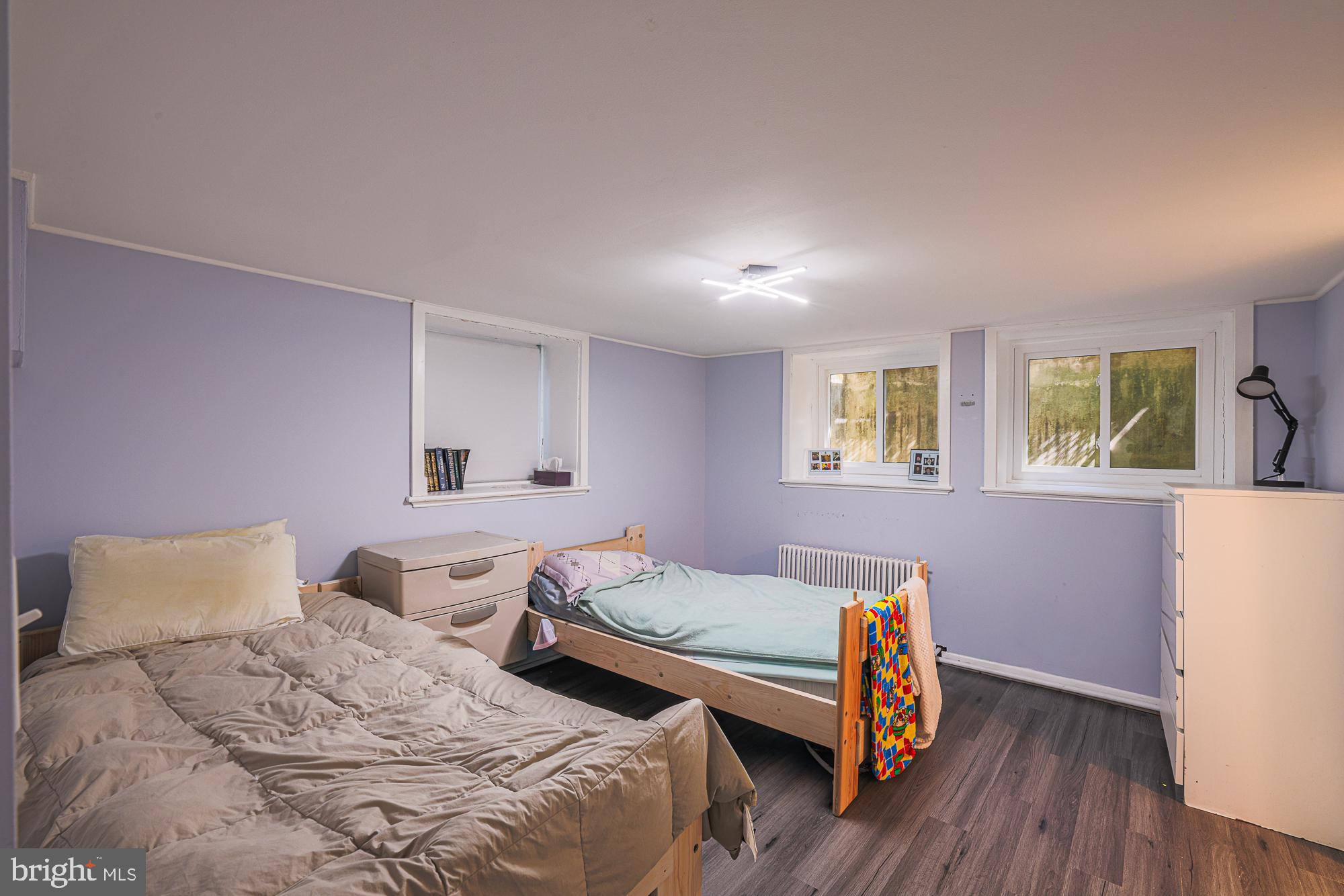 3305 Bancroft Road Baltimore, MD 21215 - Photo 42 of 61 Cozy dual bedroom with soft hues.