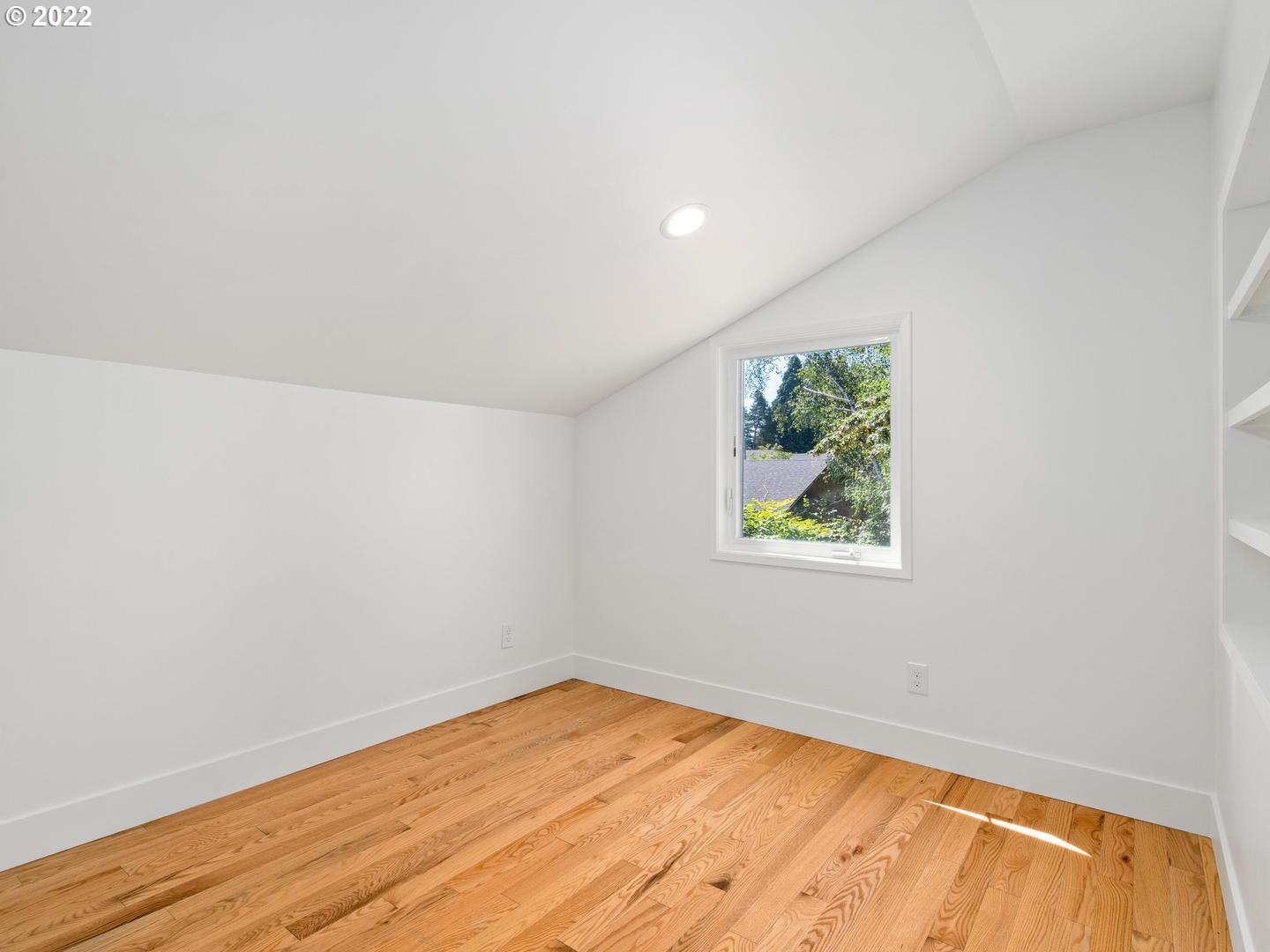 3200 Southeast Loeffelman Road Milwaukie, OR 97222 - Photo 23 of 32 an empty room with wooden floor and window