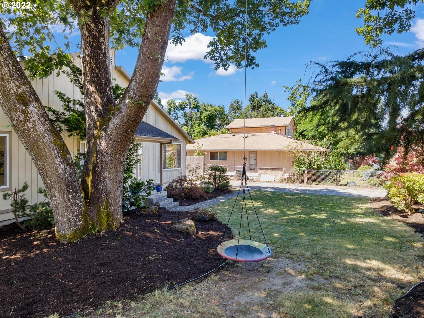 3200 Southeast Loeffelman Road Milwaukie, OR 97222 - Photo 27 of 32 a view of a house with backyard and sitting area