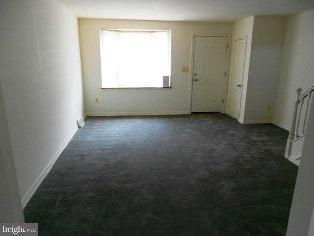 2034 Jasmine Road Dundalk, MD 21222 - Photo 4 of 23 an empty room with a window