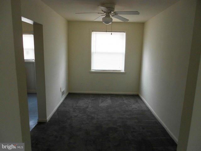 2034 Jasmine Road Dundalk, MD 21222 - Photo 7 of 23 a view of an empty room and window