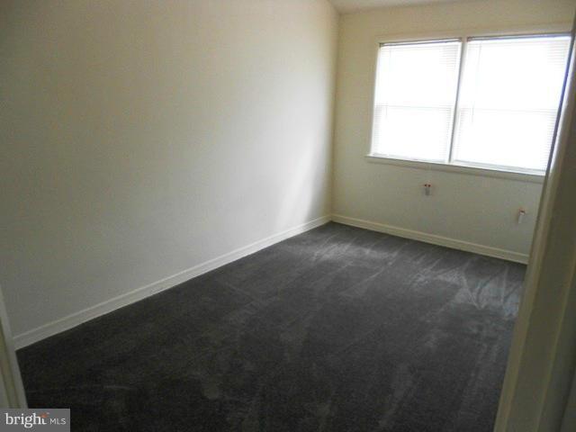 2034 Jasmine Road Dundalk, MD 21222 - Photo 10 of 23 an empty room with a window