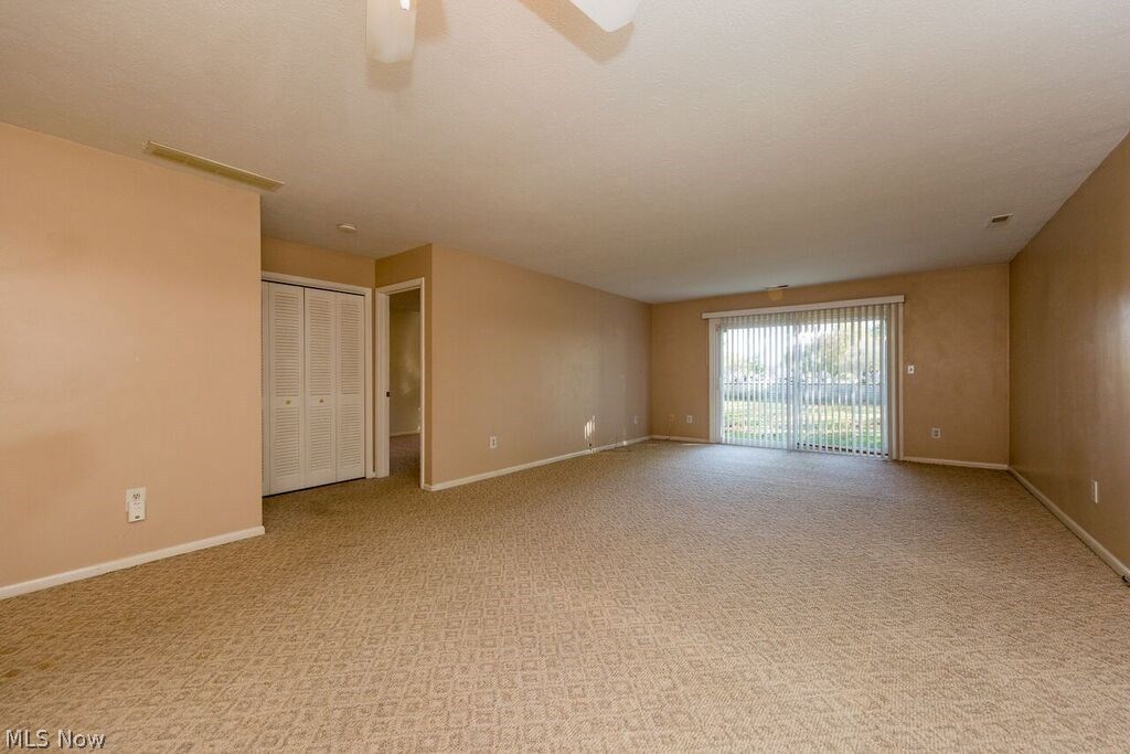 6340 Maplewood Road Mayfield Heights, OH 44124 - Photo 4 of 26 HUGE LIVING ROOM. FRESHLY PAINTED. LARGE SLIDER DOOR