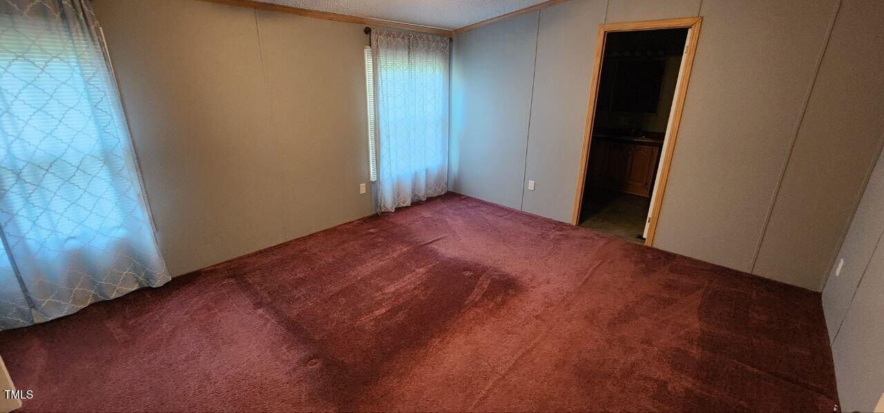 4470 Thomas Road Henderson, NC 27537 - Photo 12 of 21 an empty room with closet