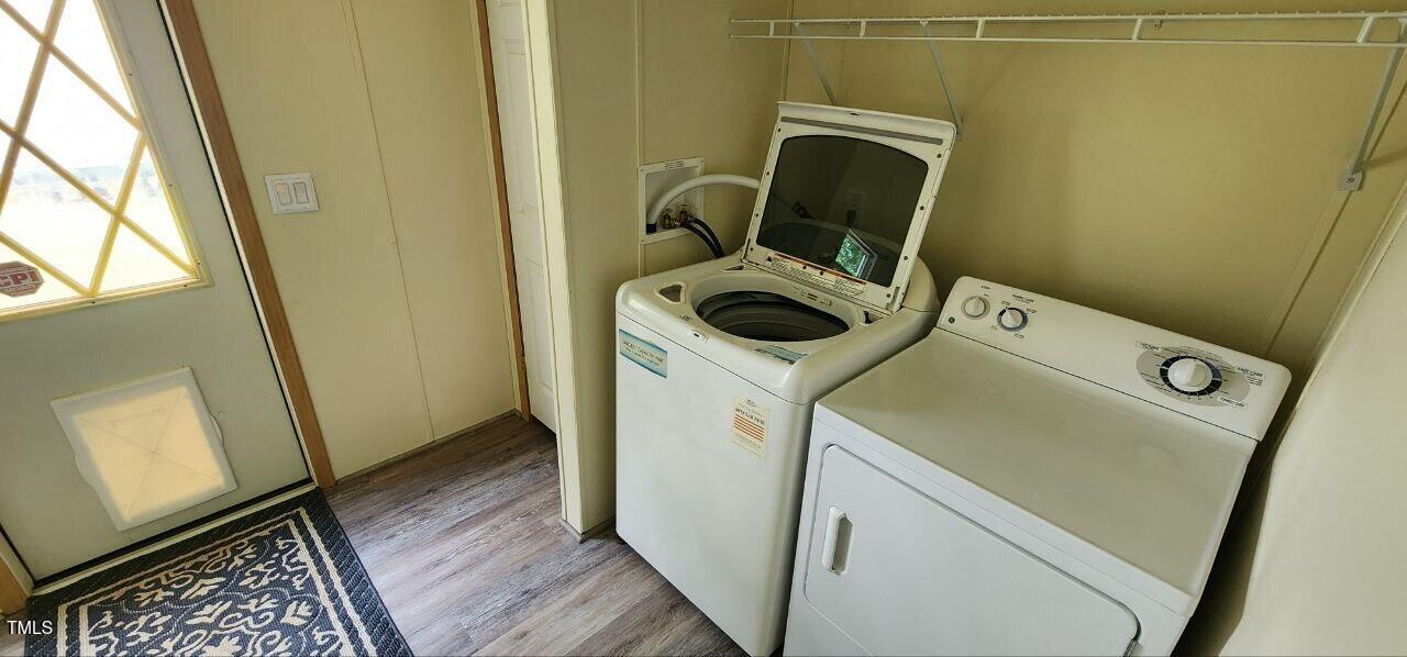 4470 Thomas Road Henderson, NC 27537 - Photo 16 of 21 a utility room with dryer and washer
