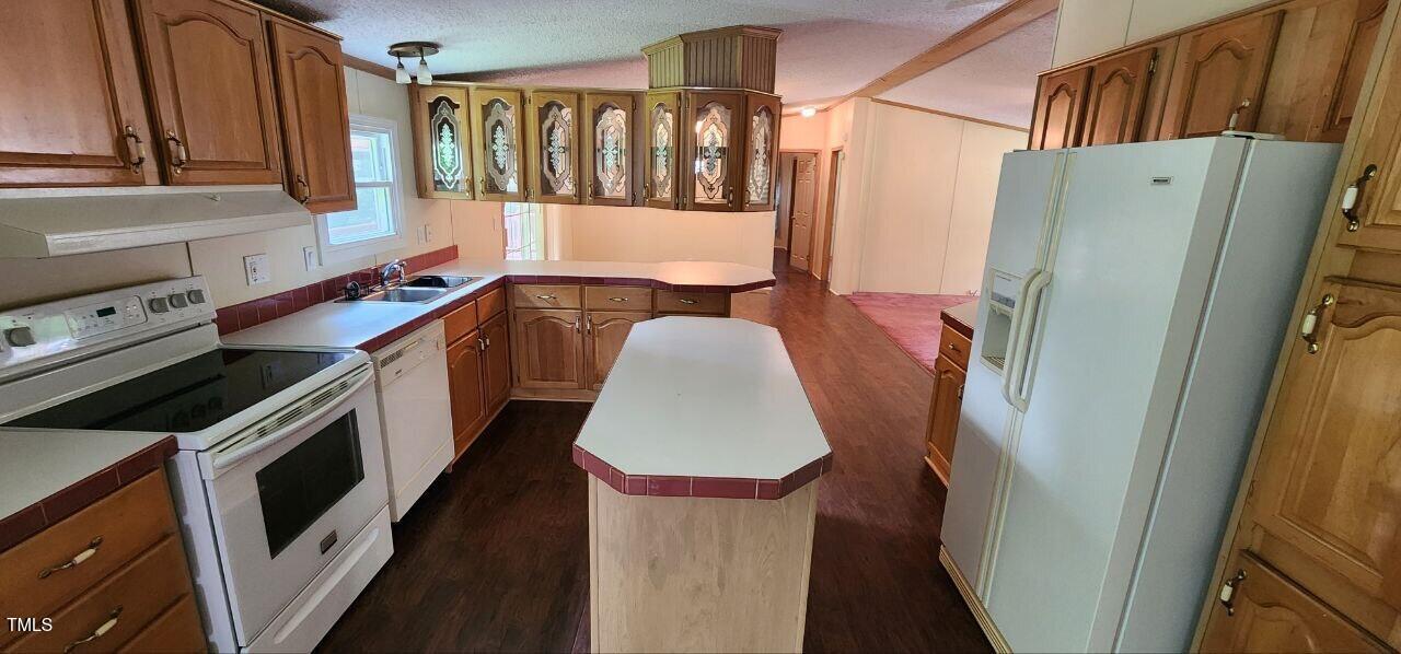 4470 Thomas Road Henderson, NC 27537 - Photo 18 of 21 a utility room with wooden floor washer and dryer