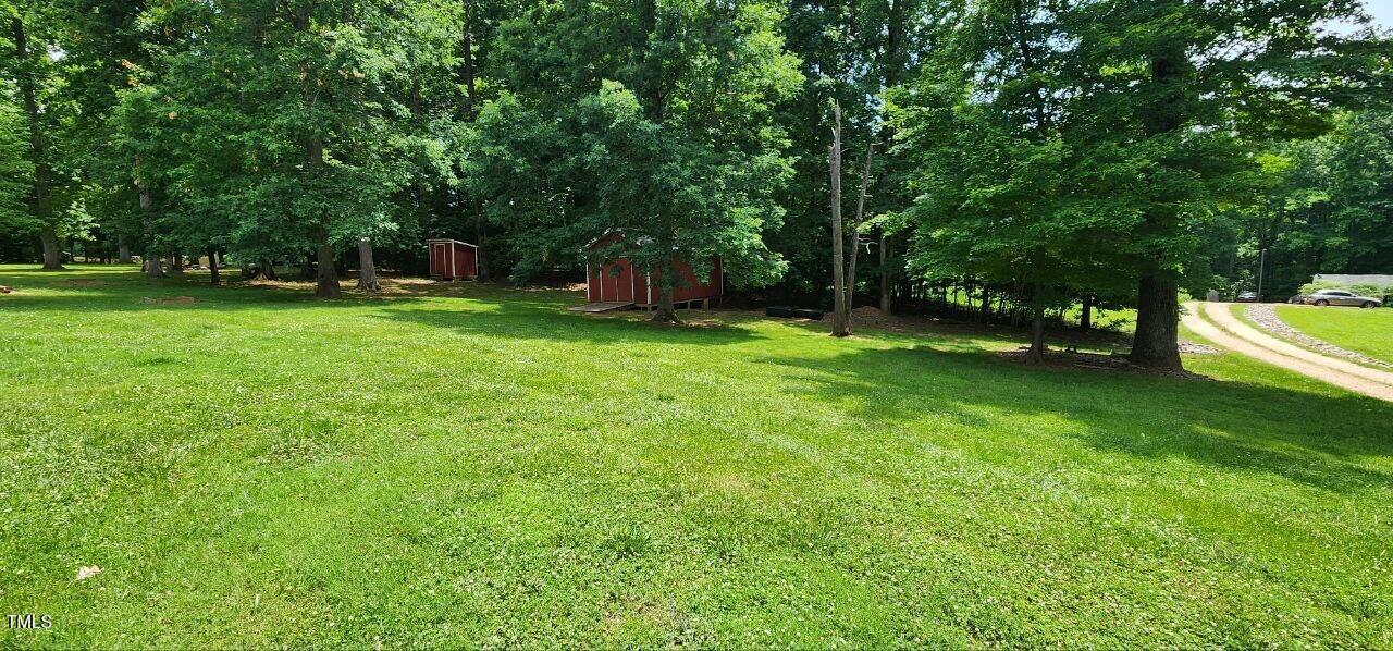 4470 Thomas Road Henderson, NC 27537 - Photo 3 of 21 a view of a backyard with a small park