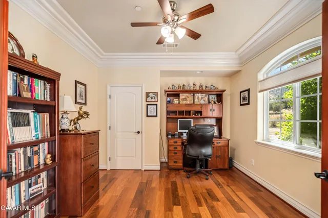 a view of a kitchen area with furniture and a window