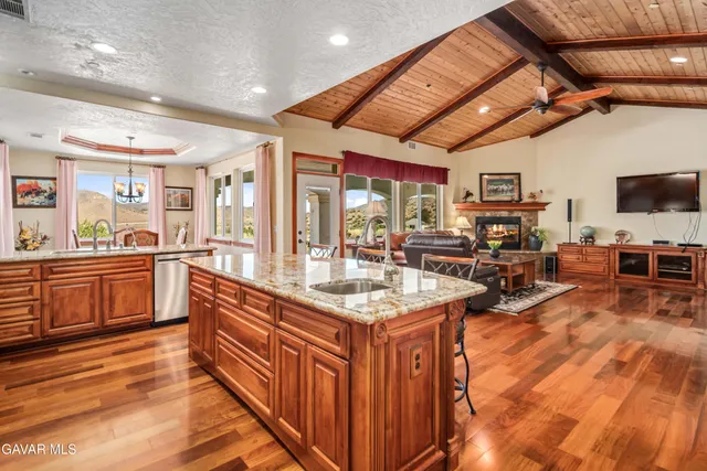 a bed room with a bed mirror and a window