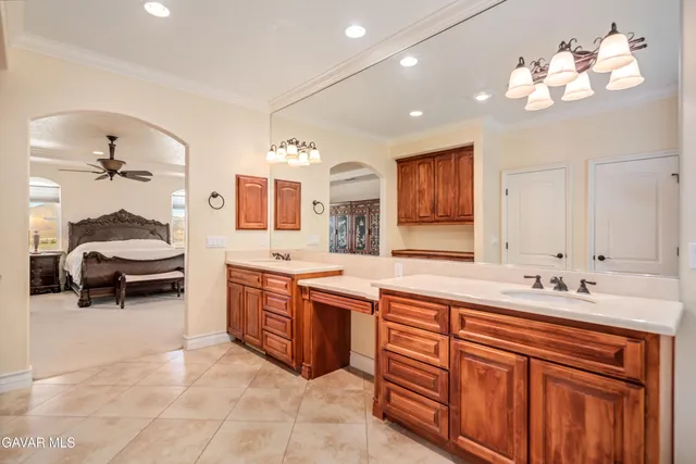 a room with furniture and pool table