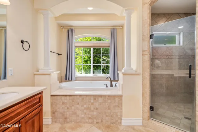 a room with furniture and a flat screen tv