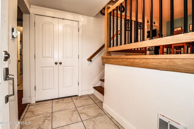 a view of an entryway with staircase