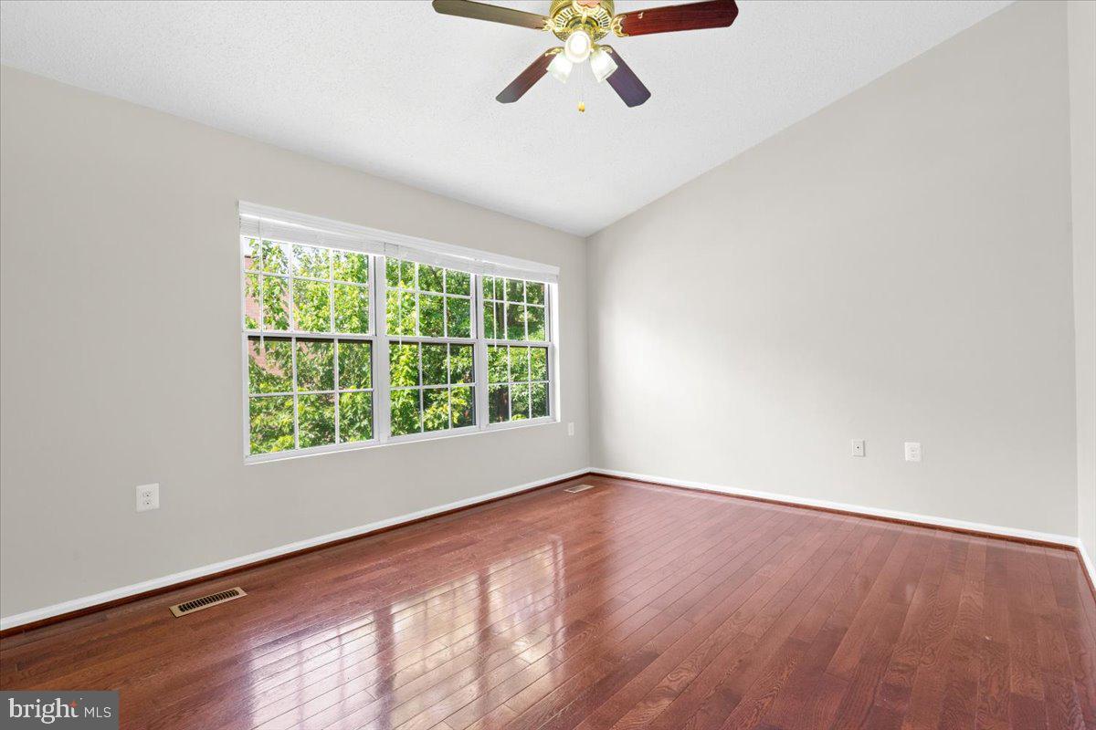 461 Foxridge Drive Southwest Leesburg, VA 20175 - Photo 14 of 25 wooden floor in an empty room with a window