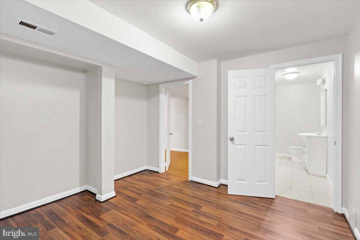 461 Foxridge Drive Southwest Leesburg, VA 20175 - Photo 20 of 25 a view of an empty room and wooden floor