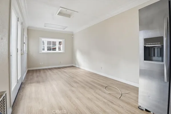 a kitchen with stainless steel appliances granite countertop a stove a sink dishwasher and a refrigerator