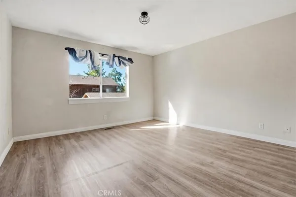 a bathroom with a shower and a toilet
