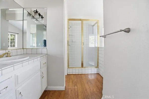 a view of a bathroom from a hallway