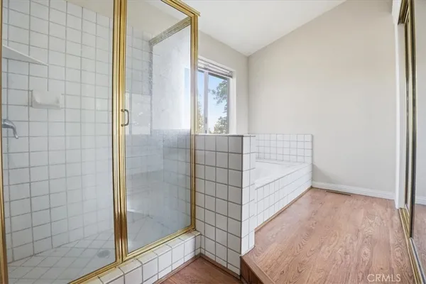 a view of a backyard with sitting area and fire pit