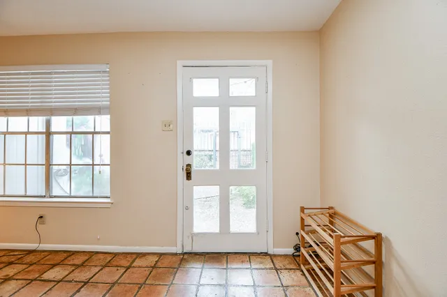 a view of an empty room and window