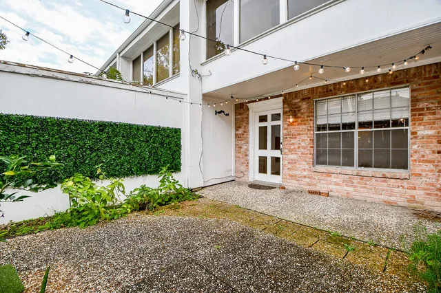 a view of a house with a garden