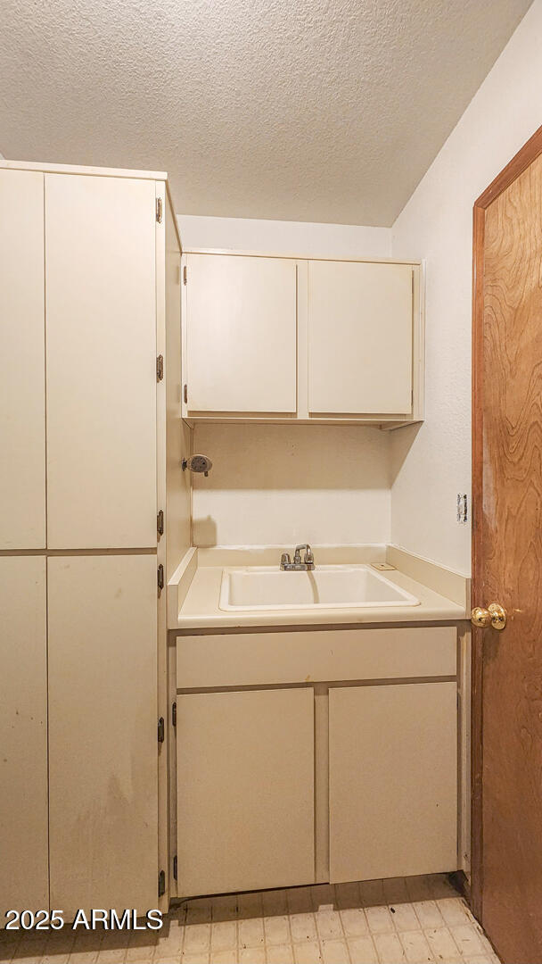 5115 Monte Vista Pine, AZ 85544 - Photo 17 of 35 a utility room with dryer and washer
