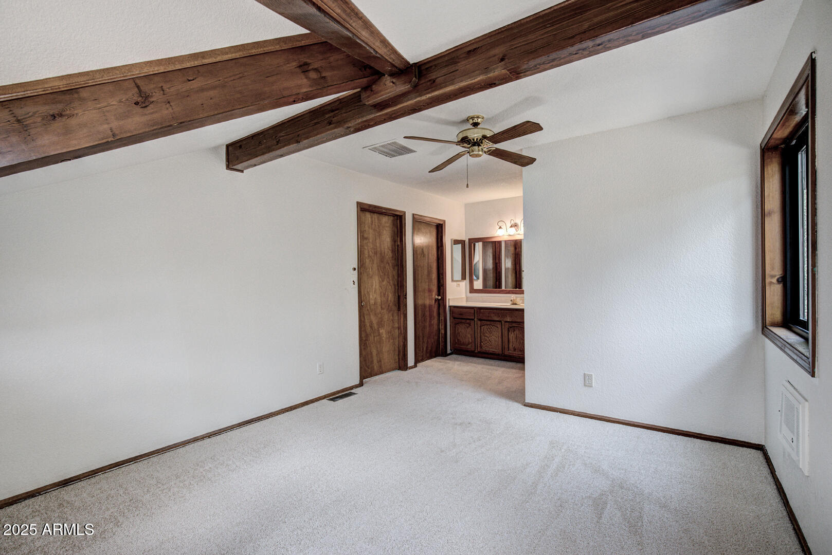 5115 Monte Vista Pine, AZ 85544 - Photo 24 of 35 a view of a hallway with a kitchen