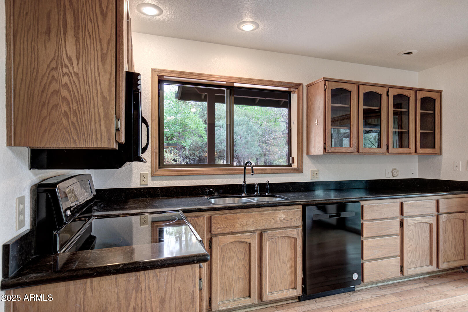 5115 Monte Vista Pine, AZ 85544 - Photo 5 of 35 a kitchen with a sink and a window