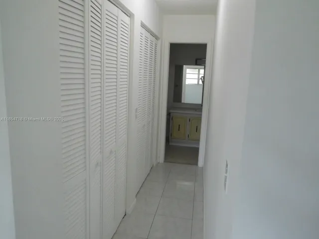 a view of hallway with sink