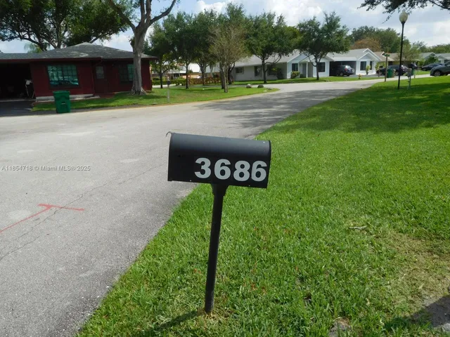 a front view of a house having yard