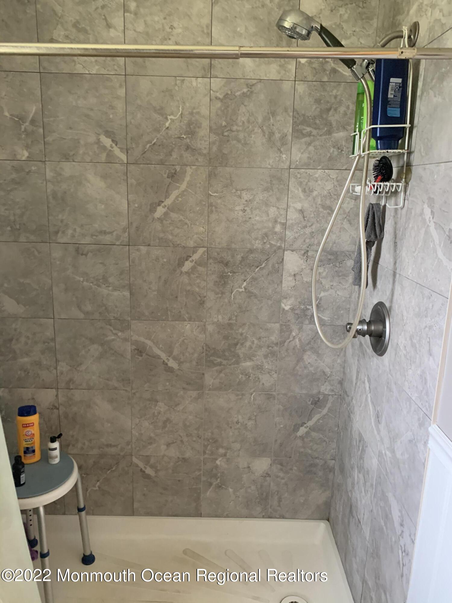 10 Phillips Road Brick, NJ 08724 - Photo 14 of 26 a bathroom with a shower