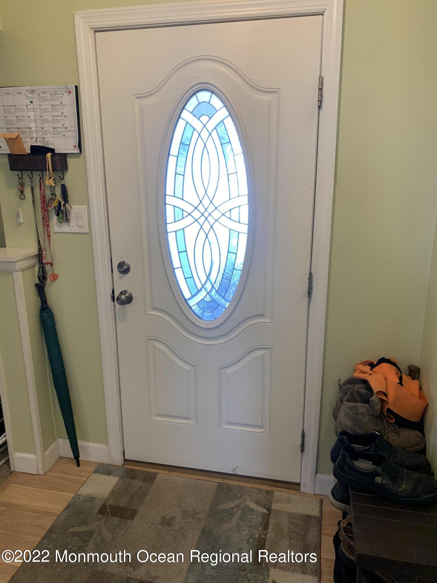 10 Phillips Road Brick, NJ 08724 - Photo 2 of 26 a view of entryway with wooden floor