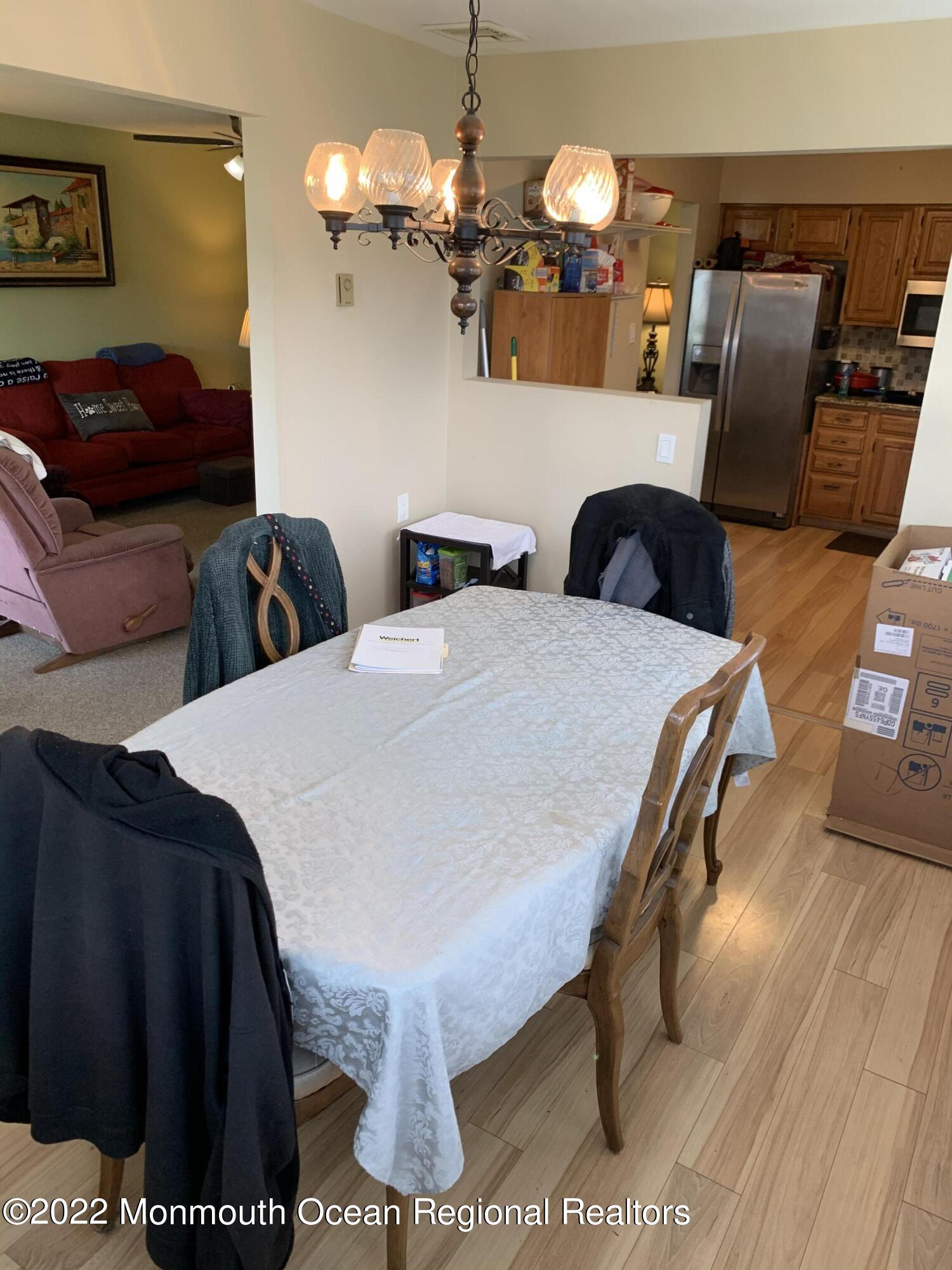 10 Phillips Road Brick, NJ 08724 - Photo 6 of 26 a view of a dining room with furniture
