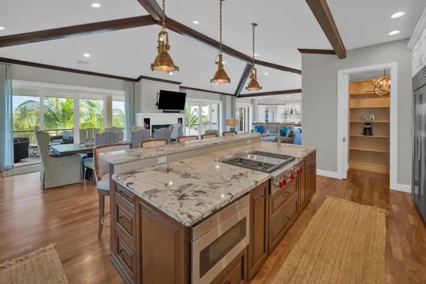 a bathroom with a sink a mirror and a shower