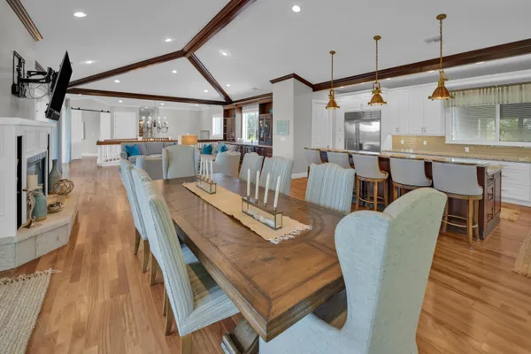 a view of a lake with lawn chairs