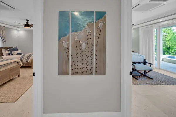 an aerial view of residential house with outdoor space and trees all around