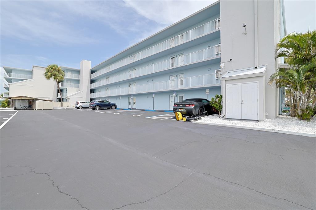 3700 South Atlantic Avenue, Unit 414 New Smyrna Beach, FL 32169 - Photo 3 of 30 a car parked on the side of the road