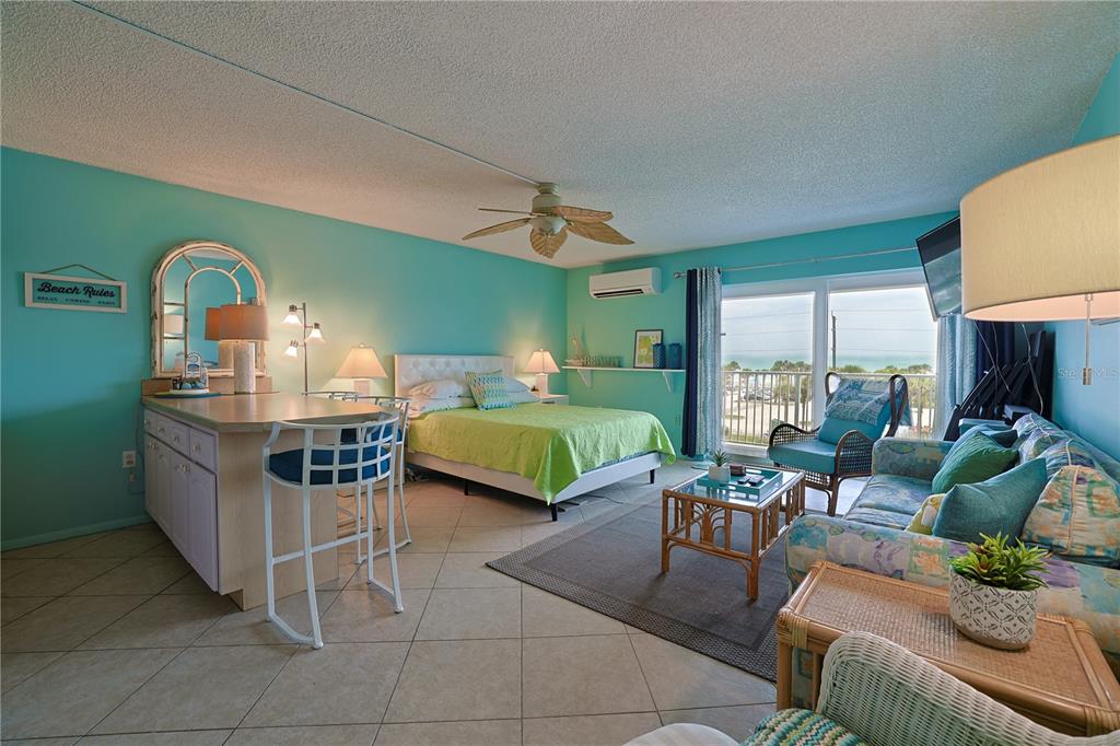 3700 South Atlantic Avenue, Unit 414 New Smyrna Beach, FL 32169 - Photo 9 of 30 a living room with furniture