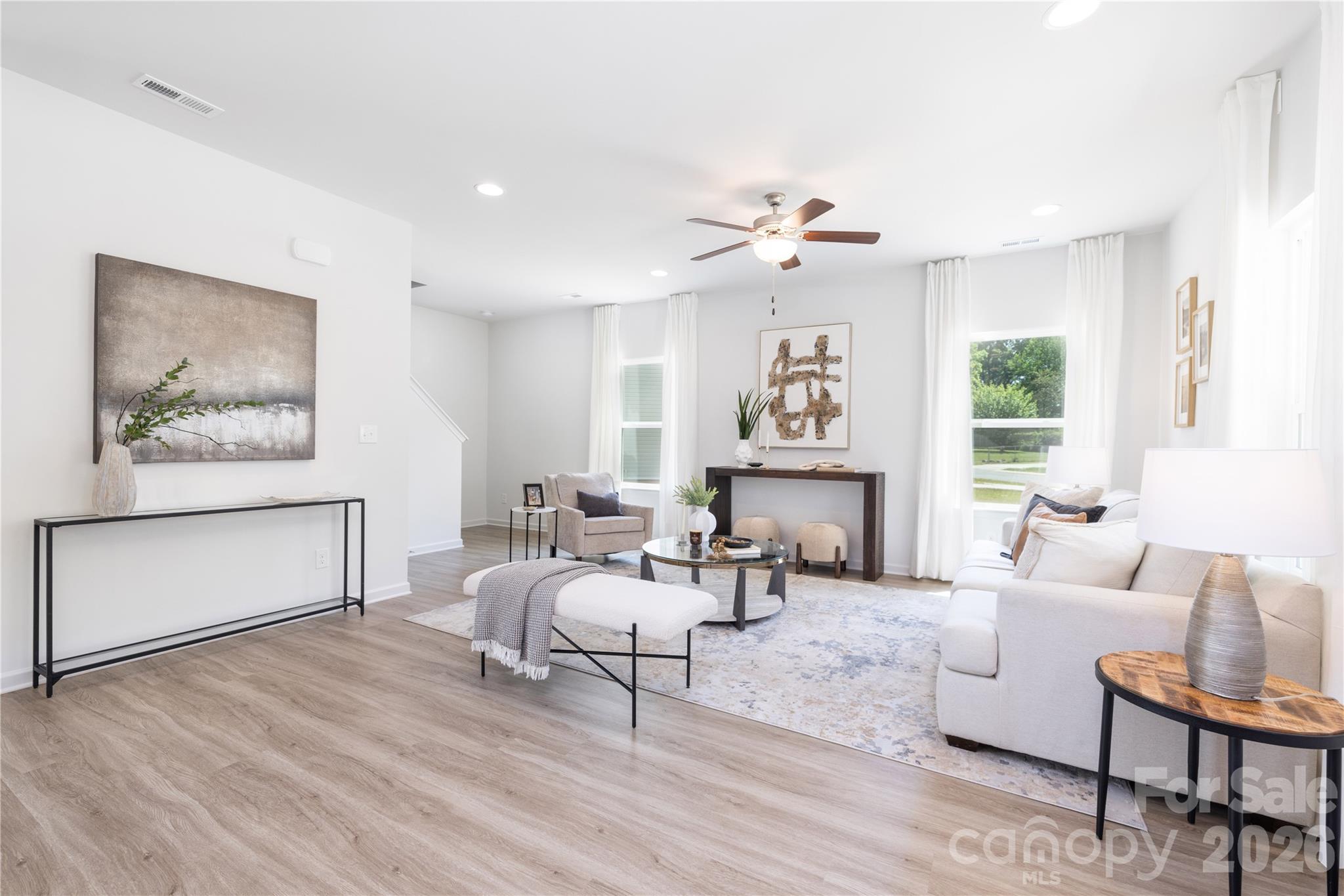 5514 Anderson Road Charlotte, NC 28269 - Photo 12 of 20 a living room with furniture and a large window