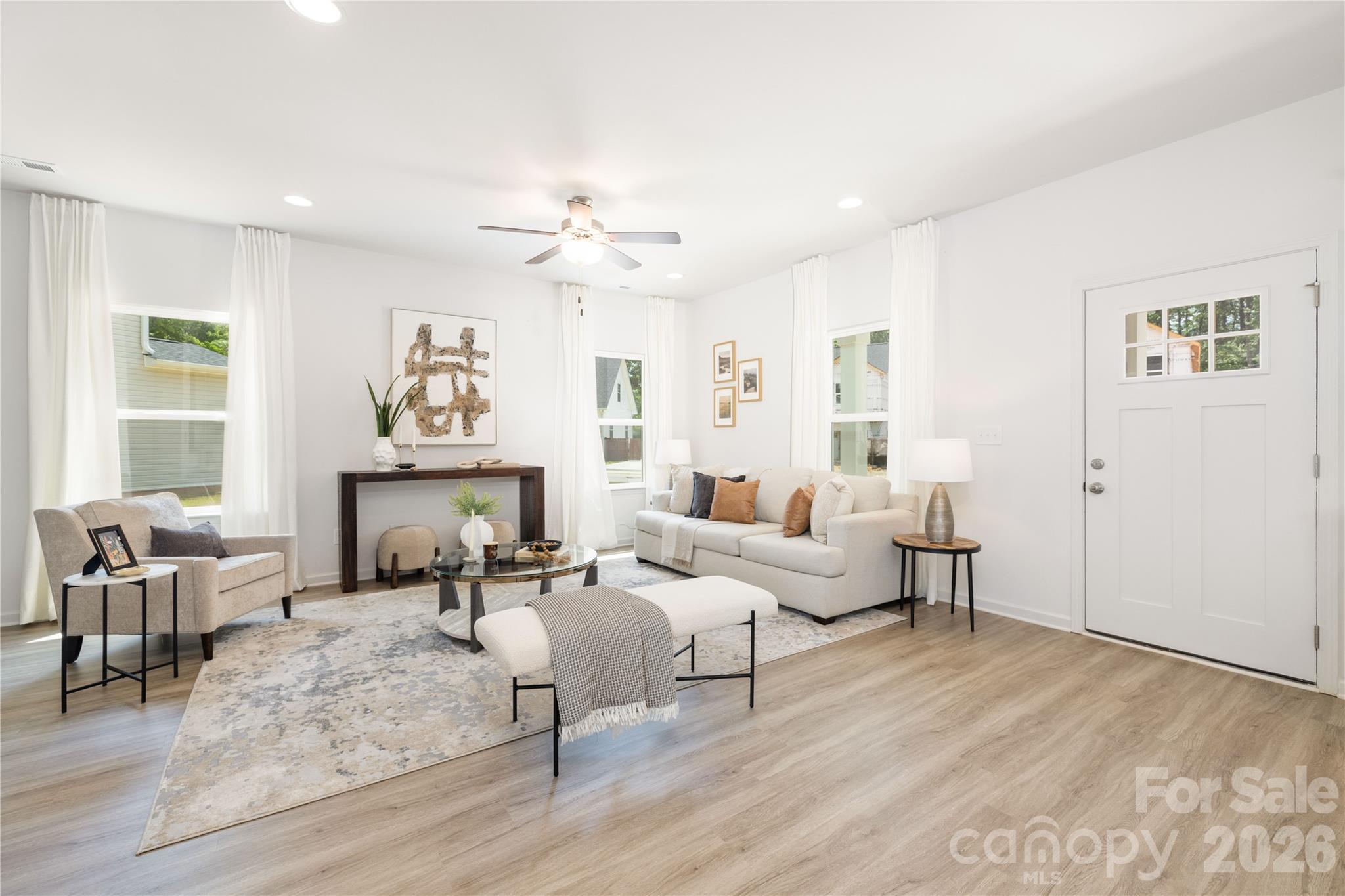 5514 Anderson Road Charlotte, NC 28269 - Photo 15 of 20 a living room with furniture and a fireplace