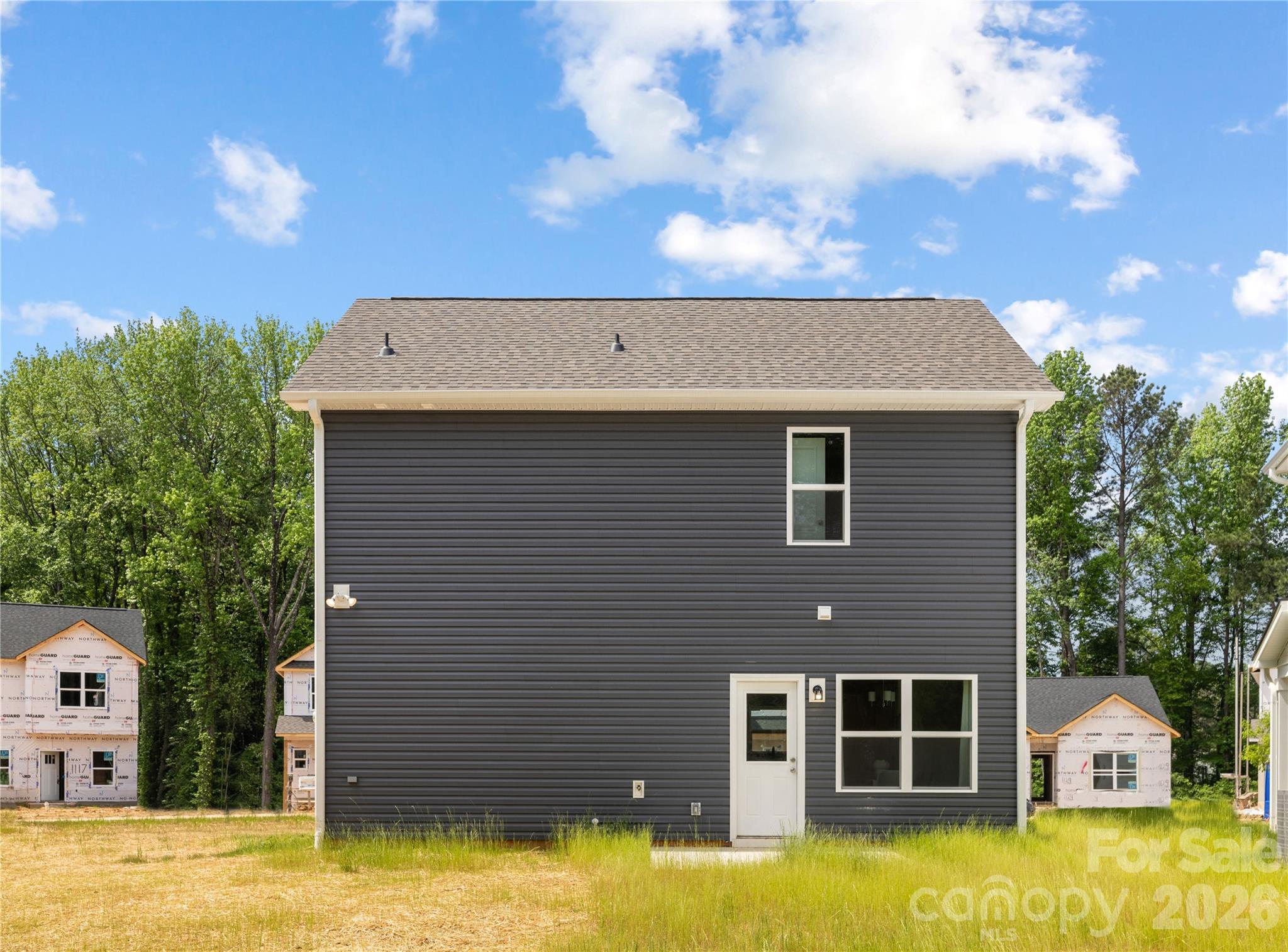 5514 Anderson Road Charlotte, NC 28269 - Photo 20 of 20 a front view of a house with a yard
