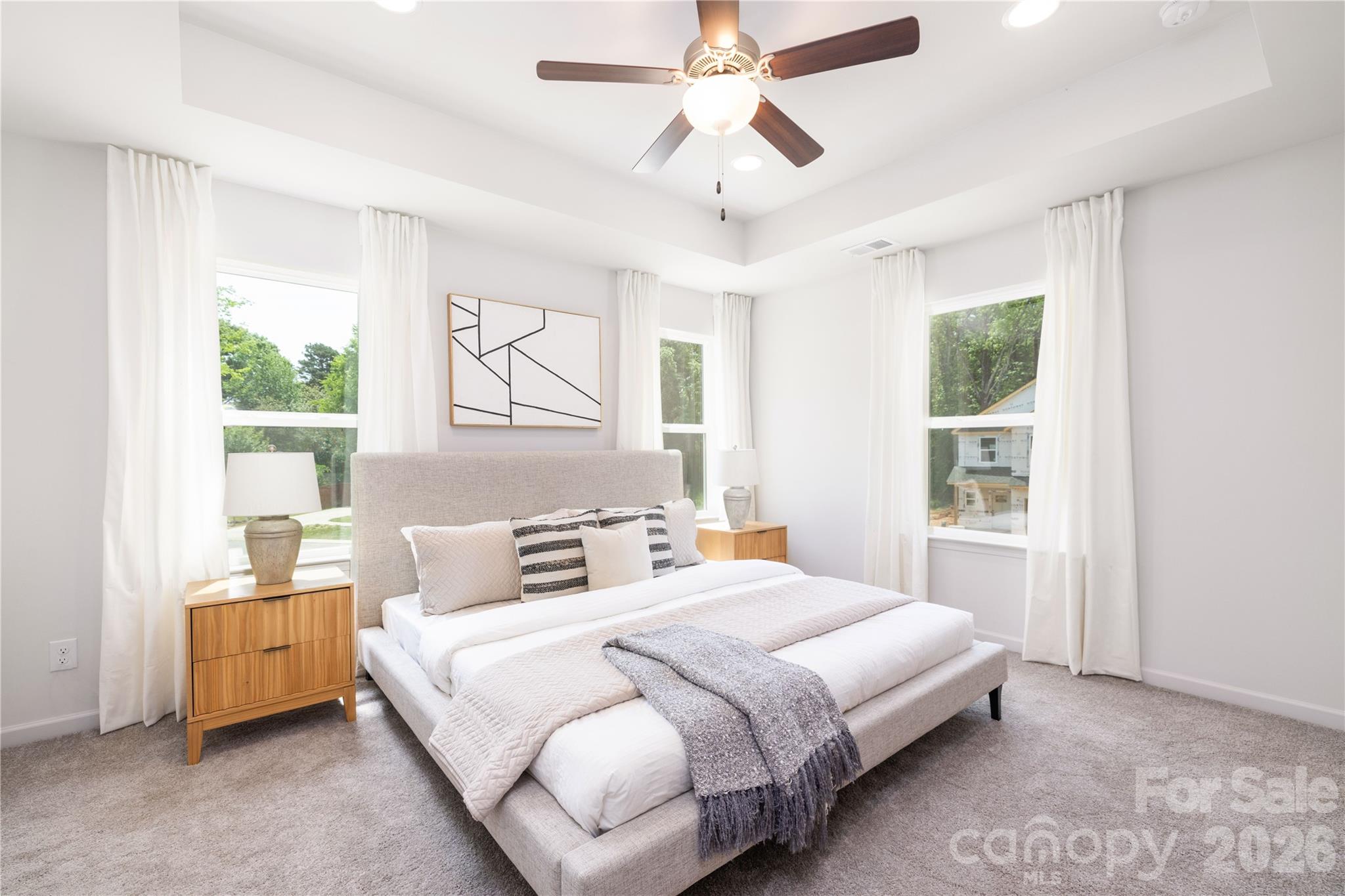 5514 Anderson Road Charlotte, NC 28269 - Photo 9 of 20 a bedroom with a large bed and a window