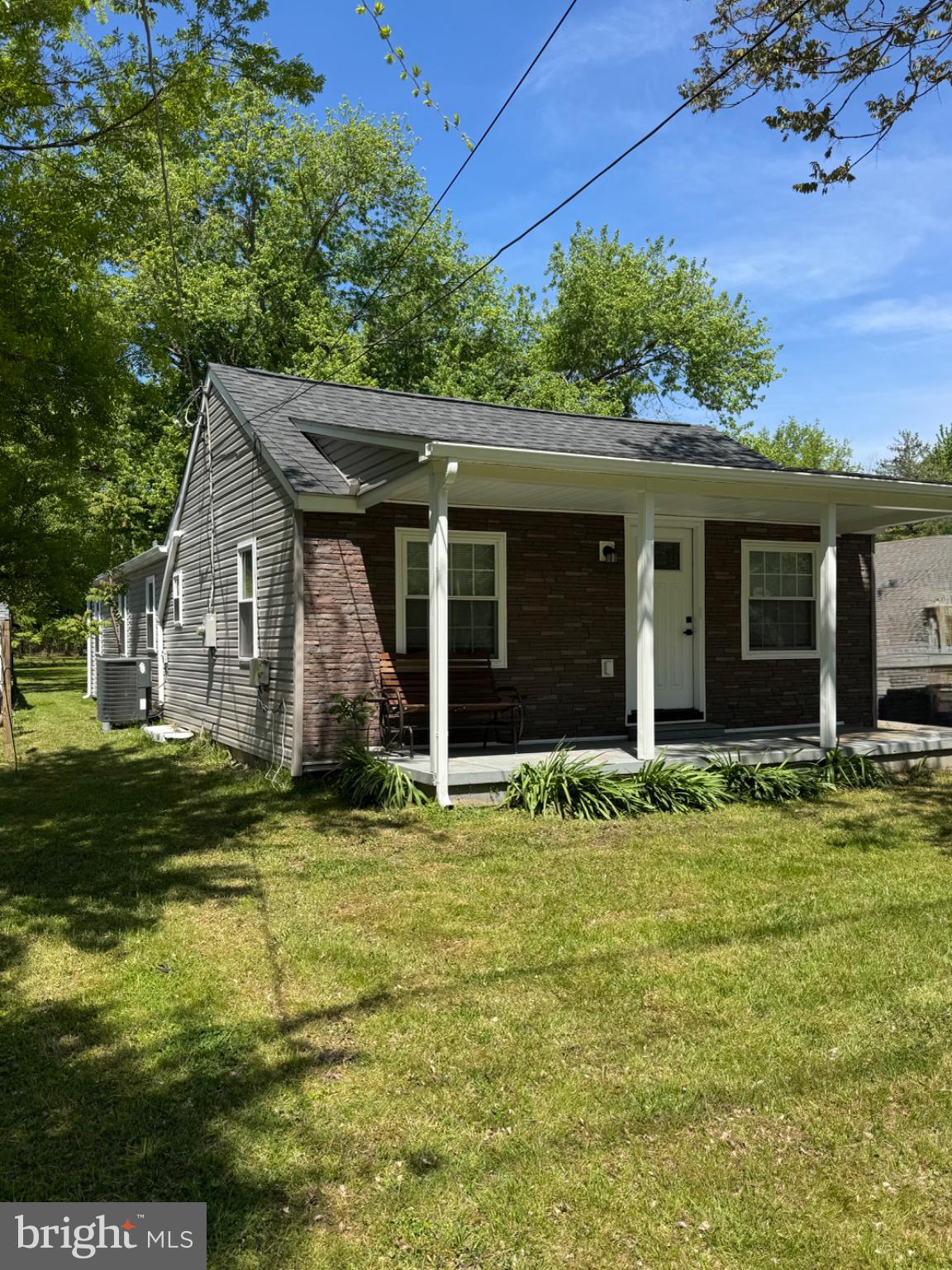 2389 White Oak Road Dover, DE 19901 - Photo 2 of 34 a front view of a house with a garden