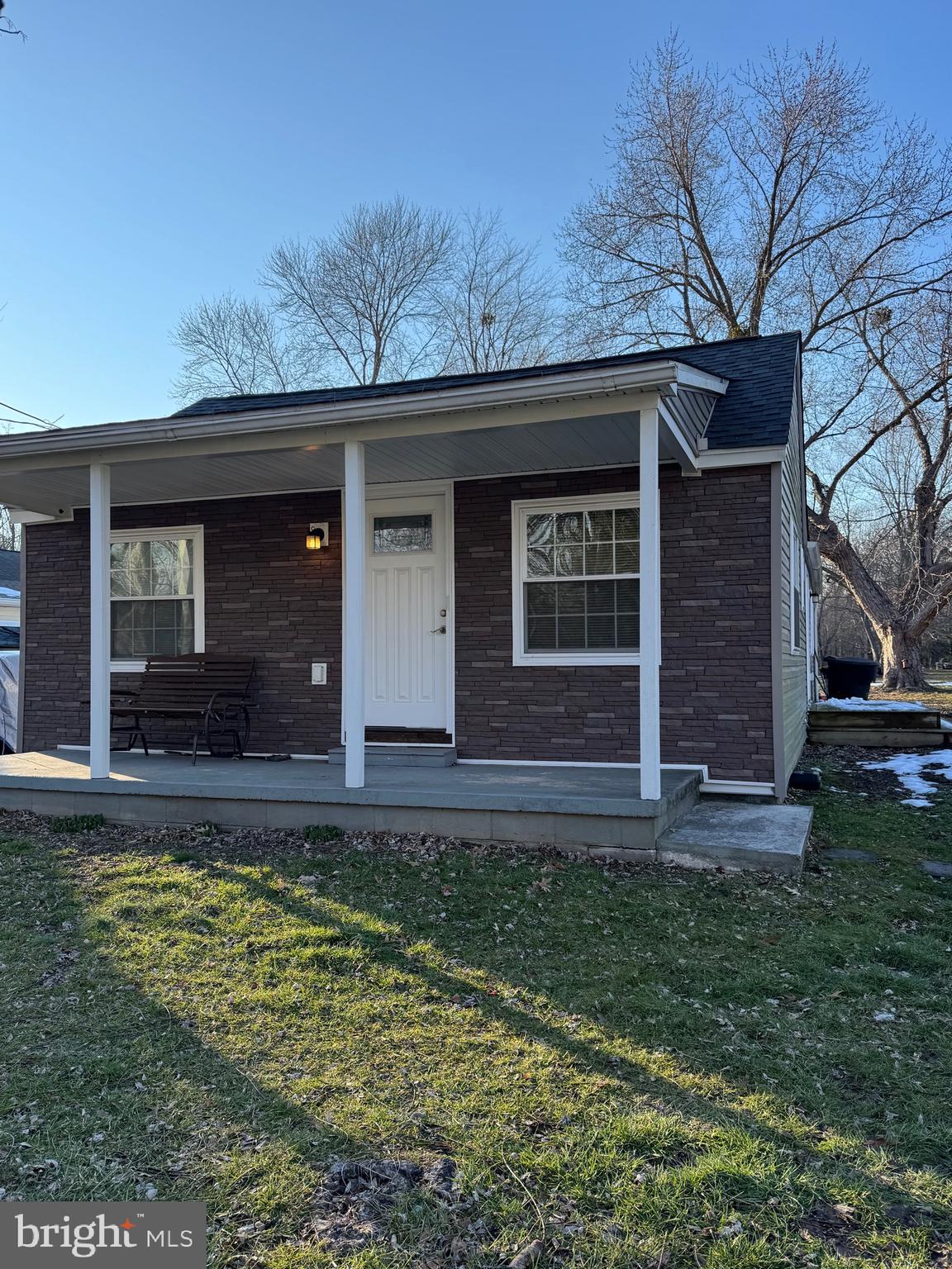 2389 White Oak Road Dover, DE 19901 - Photo 6 of 25 a front view of a house with garden