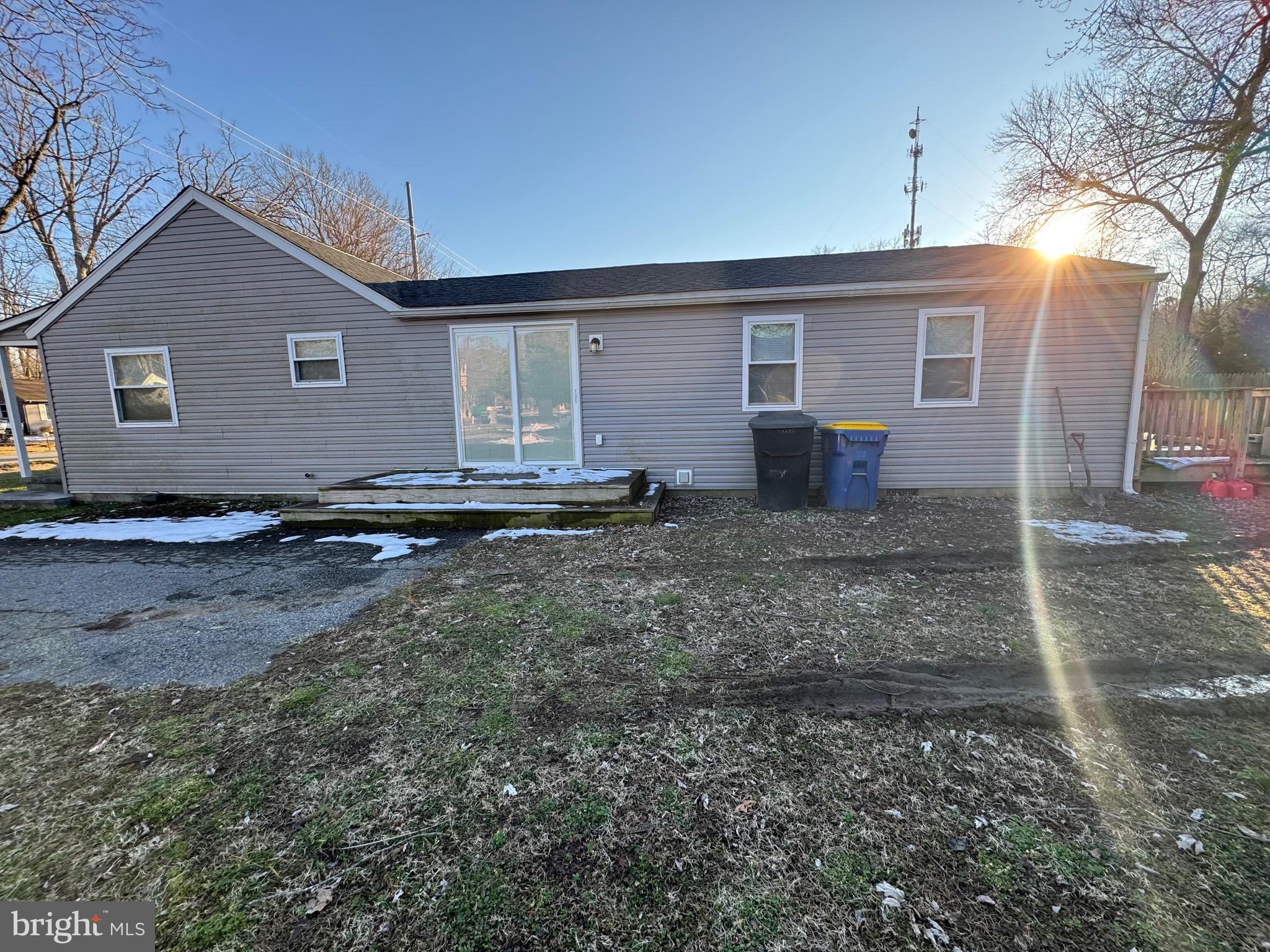 2389 White Oak Road Dover, DE 19901 - Photo 8 of 25 a front view of a house with a yard