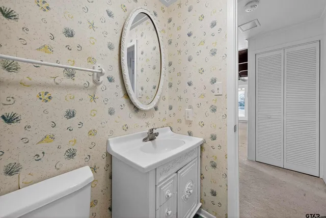 a view of a livingroom with furniture and hardwood