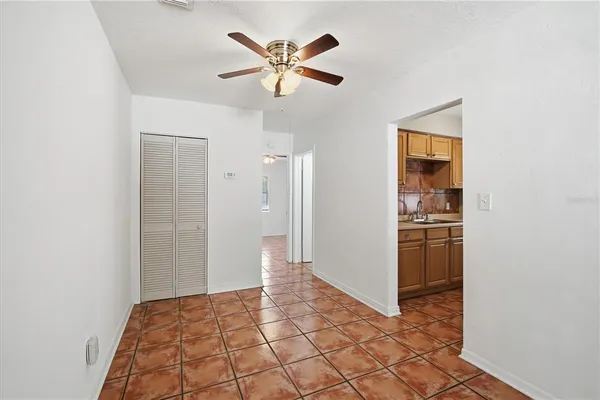 a view of livingroom with hardwood floor and a ceiling fan