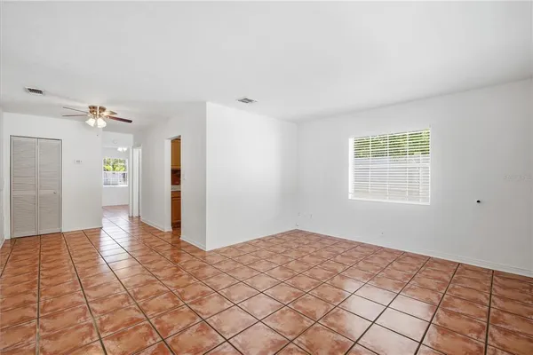 a view of an empty room and window